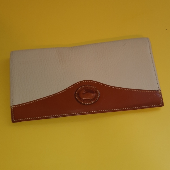 Dooney and bourke new checkbook cover.